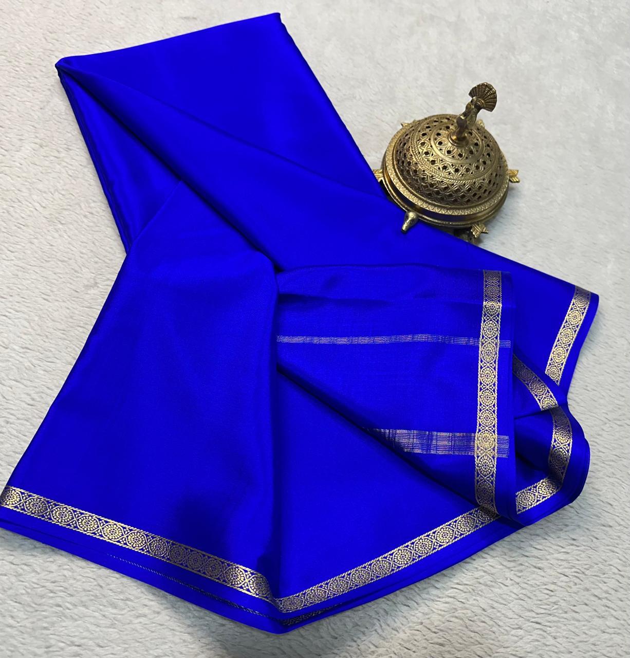 Graceful Plain Mysore Crepe Saree In Royal Blue With Heritage Zari Border Work