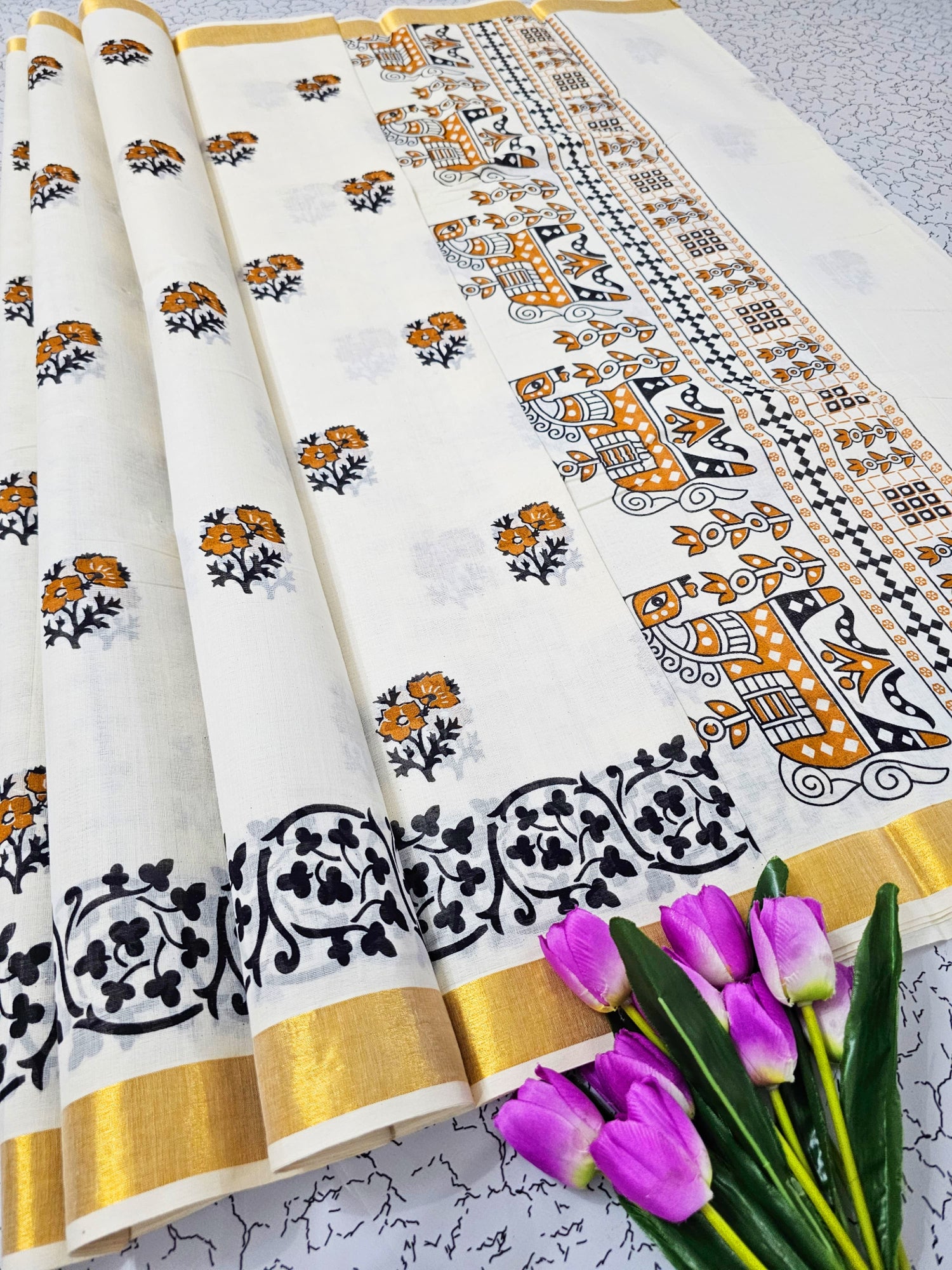 White Southloom Kerala Saree With Ethnic Prints Includes Unstitched Blouse