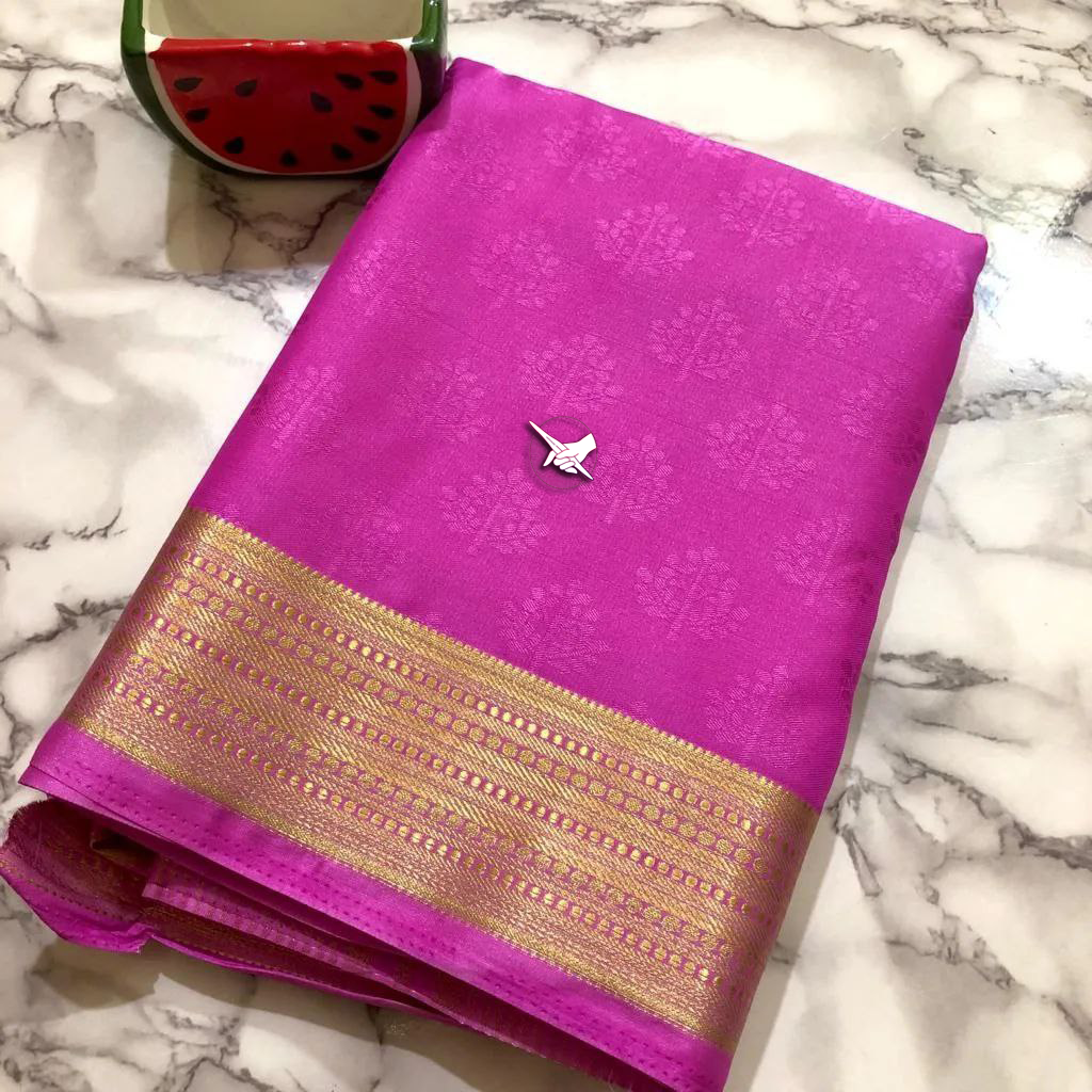 Charming Magenta Semi Silk Saree With Lightweight Texture And Gloss Finish