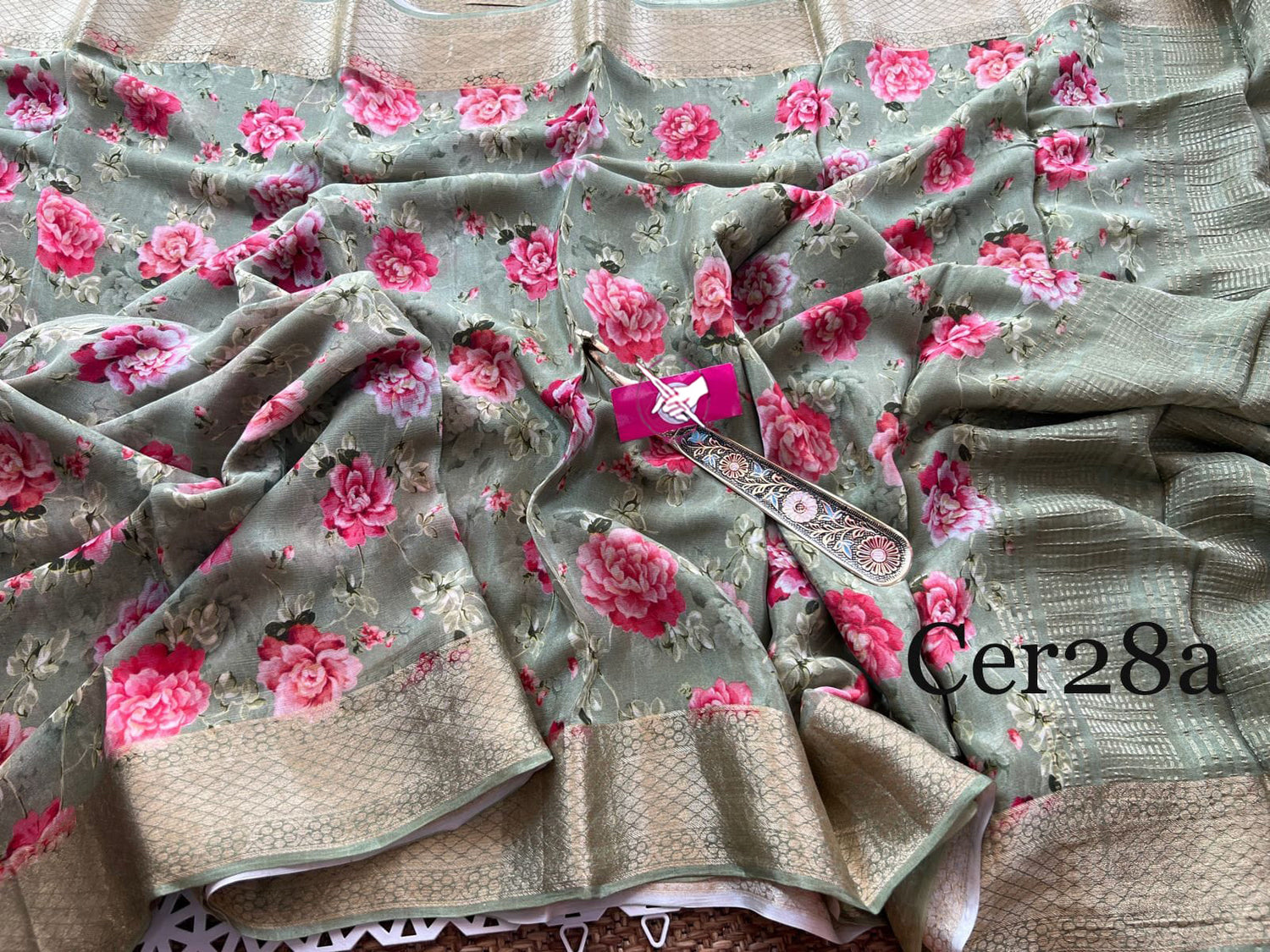 Daily Charm Green Soft Silk Saree With Printed Details And Ethnic Appeal