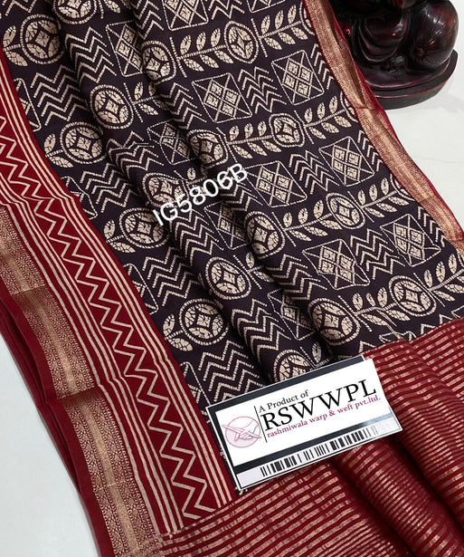 "Elegant blue and white Dolk print Banarasi saree featuring a stunning zari border