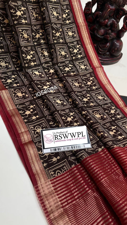 "Black  Maheswari saree with Mangalagiri jari border, exuding elegance and tradition."