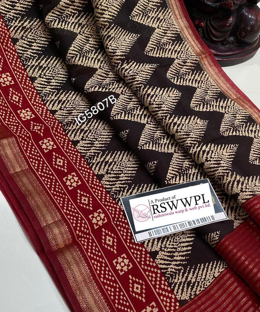 "Stylish leaf print Dola silk saree with tassels."