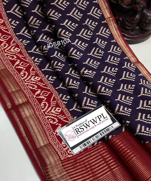 "Deep blue Maheswari saree with Mangalagiri jari border, exuding elegance and tradition."