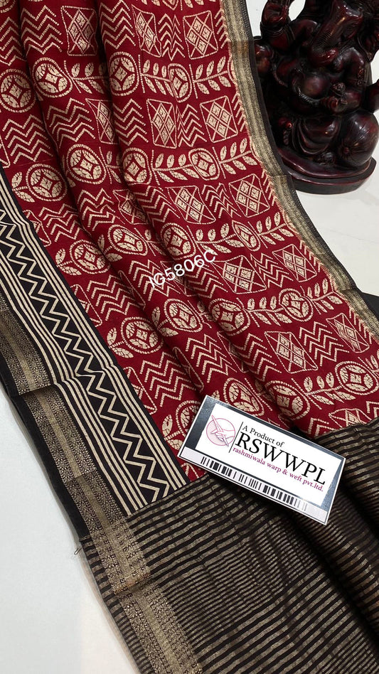 "Elegant Red and  Black Dola print Banarasi saree featuring a stunning zari border.