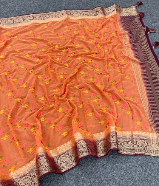 💕 Excellent Orange Banarasi saree adorned with intricate embroidery work. 💕