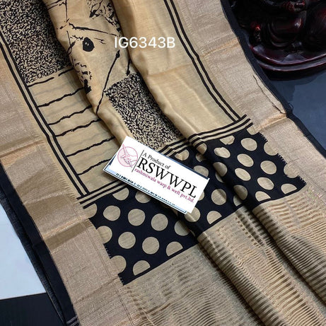 Light Brown  Lightweight, soft Assam silk with woven border and beautiful prints.