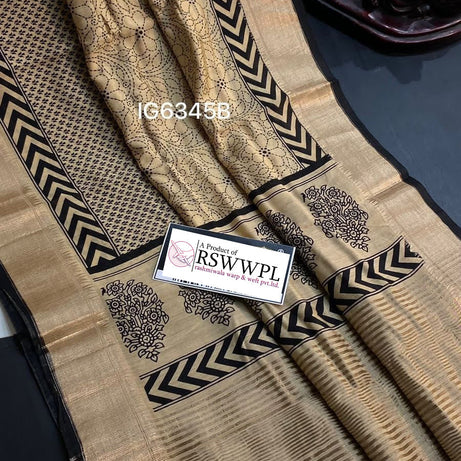 Light Brown  Lightweight, soft Assam silk with woven border and beautiful prints.