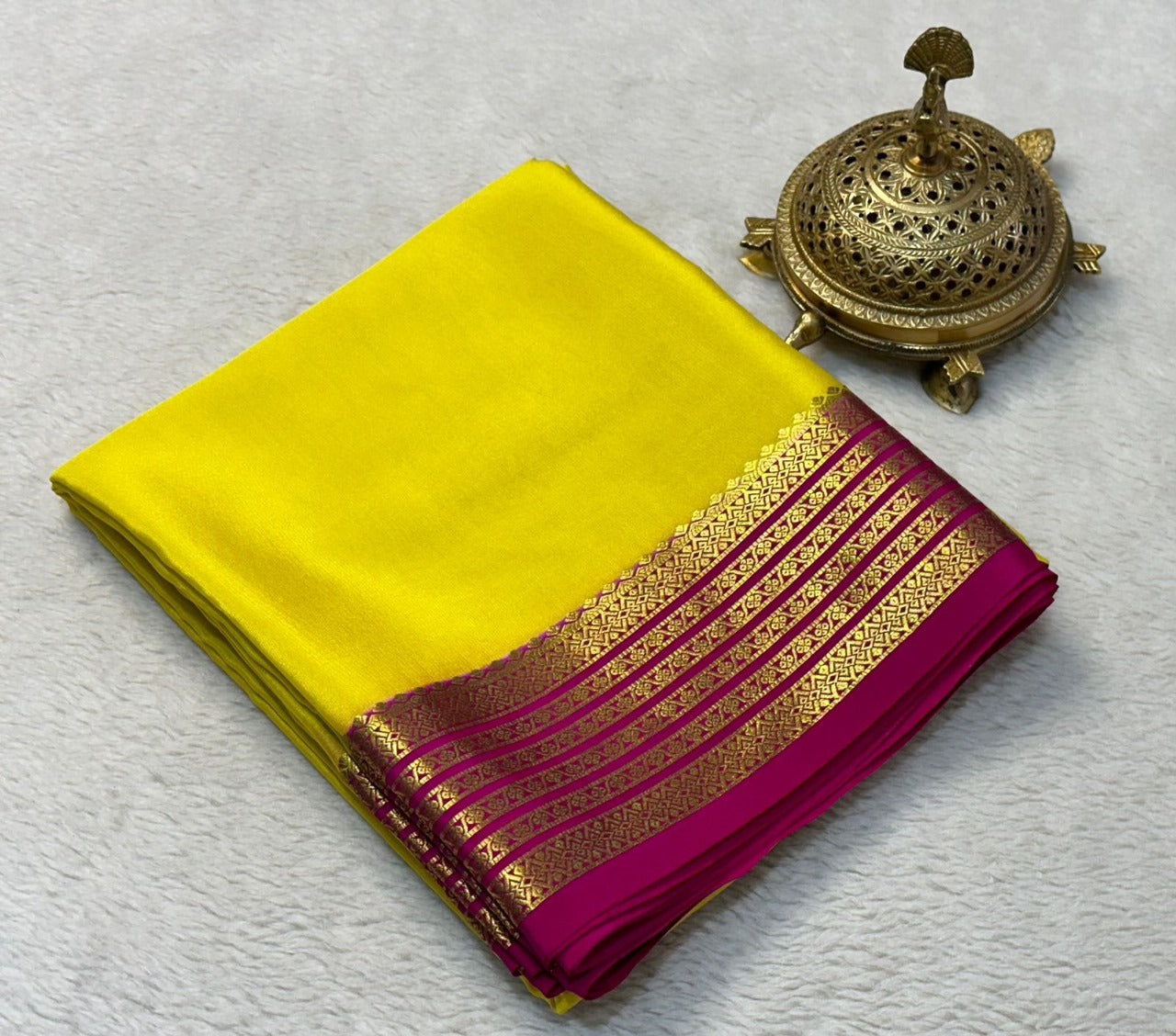 Festive Wear Yellow Mysore Silk Saree With Plain Look