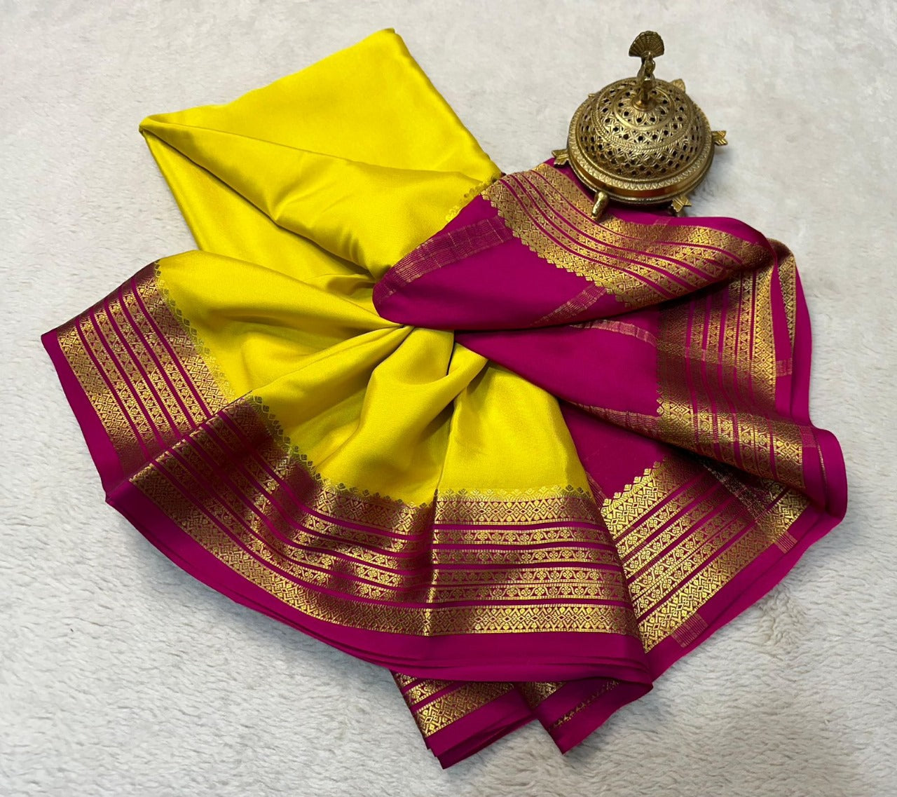 Festive Wear Yellow Mysore Silk Saree With Plain Look