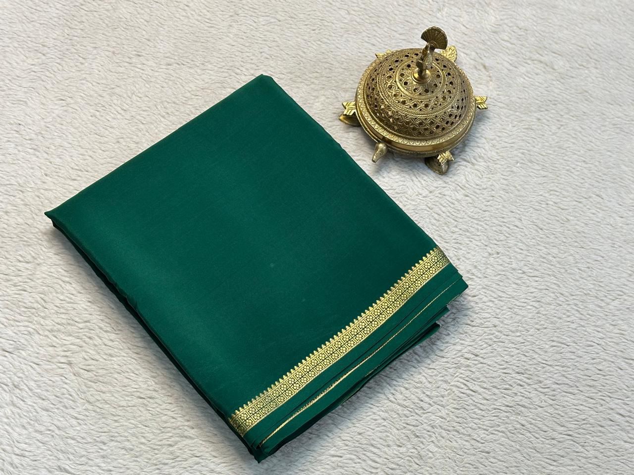 Festive Ready Green Mysore Crepe Plain Silk Saree With Ornate Zari Border