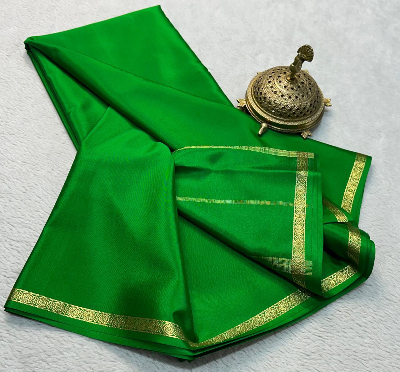 Elegant Green Plain Mysore Crepe Silk Saree With Rich Zari Border