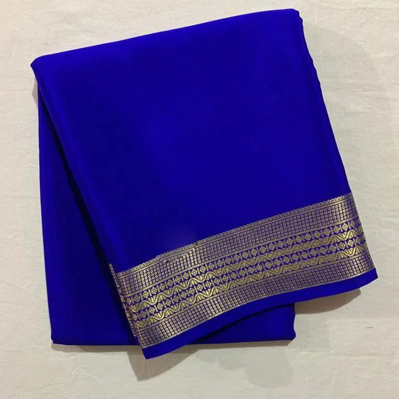Attractive Red Crepe Silk Weaving Zari Border Saree With Fancy Blouse