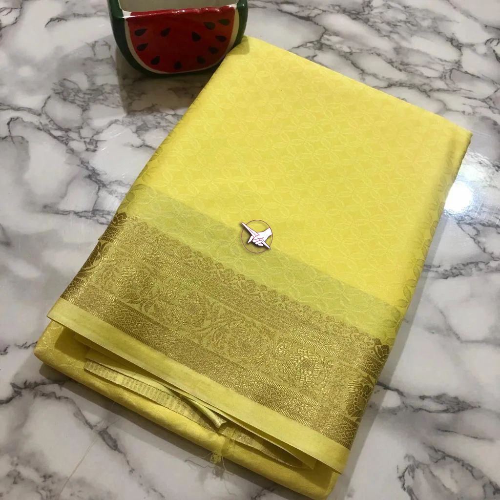 🥰 Elegant Yellow semi-silk saree with soft texture and delicate shine.🥰