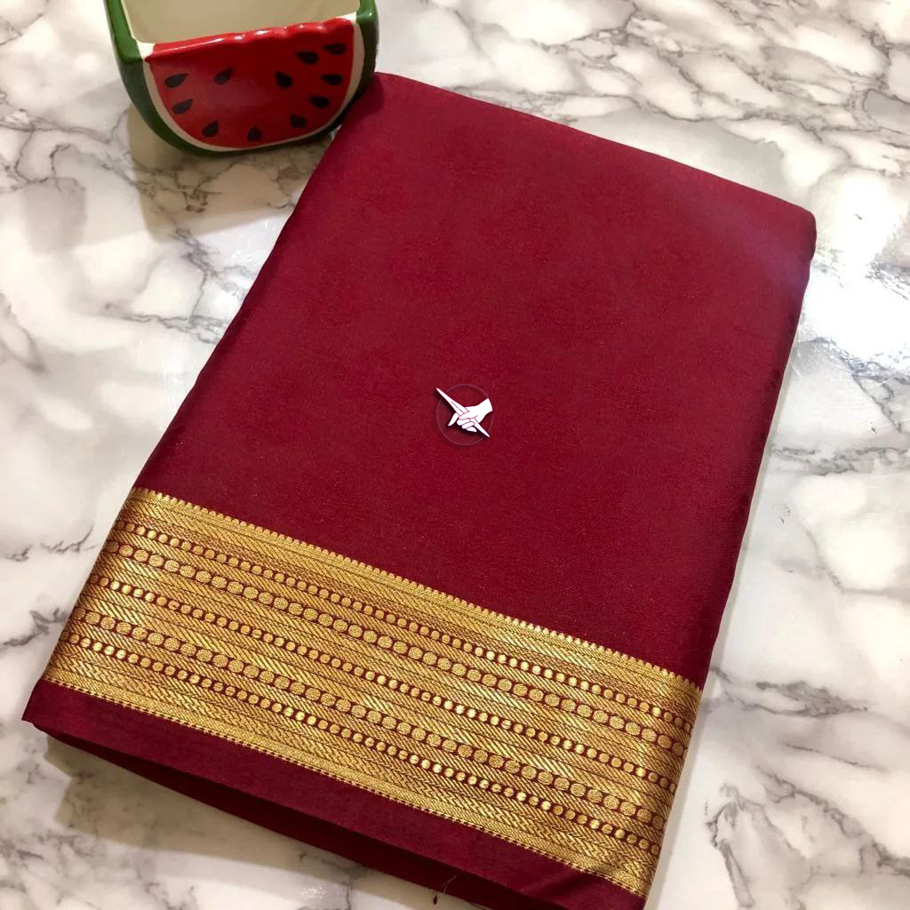 Vibrant Maroon Traditional Semi Silk Saree With Smooth Glossy Surface